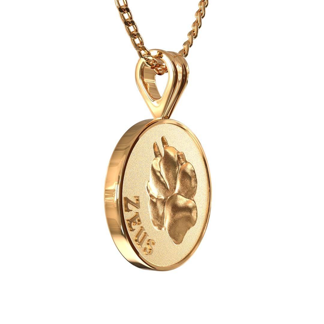Goldene Halskette mit ovalem Anhänger, eingravierte Pfote und Gravur Zeus